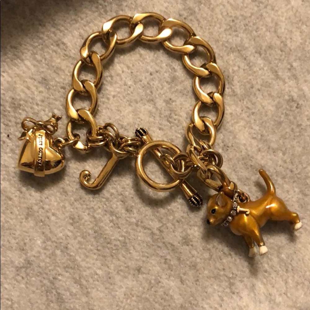Juicy couture gold bracelet with charms